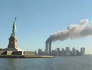 220px-national_park_service_9-11_statue_of_liberty_and_wtc_fire.jpg